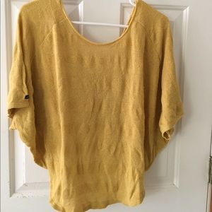 Open sleeved backless tunic